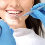 dental checkup with smiling woman
